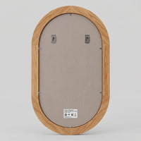 Miroir ovale en bois